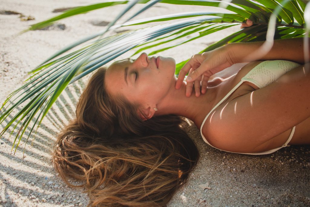 Tanned Smiling Woman Posed